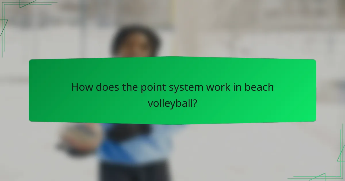 How does the point system work in beach volleyball?