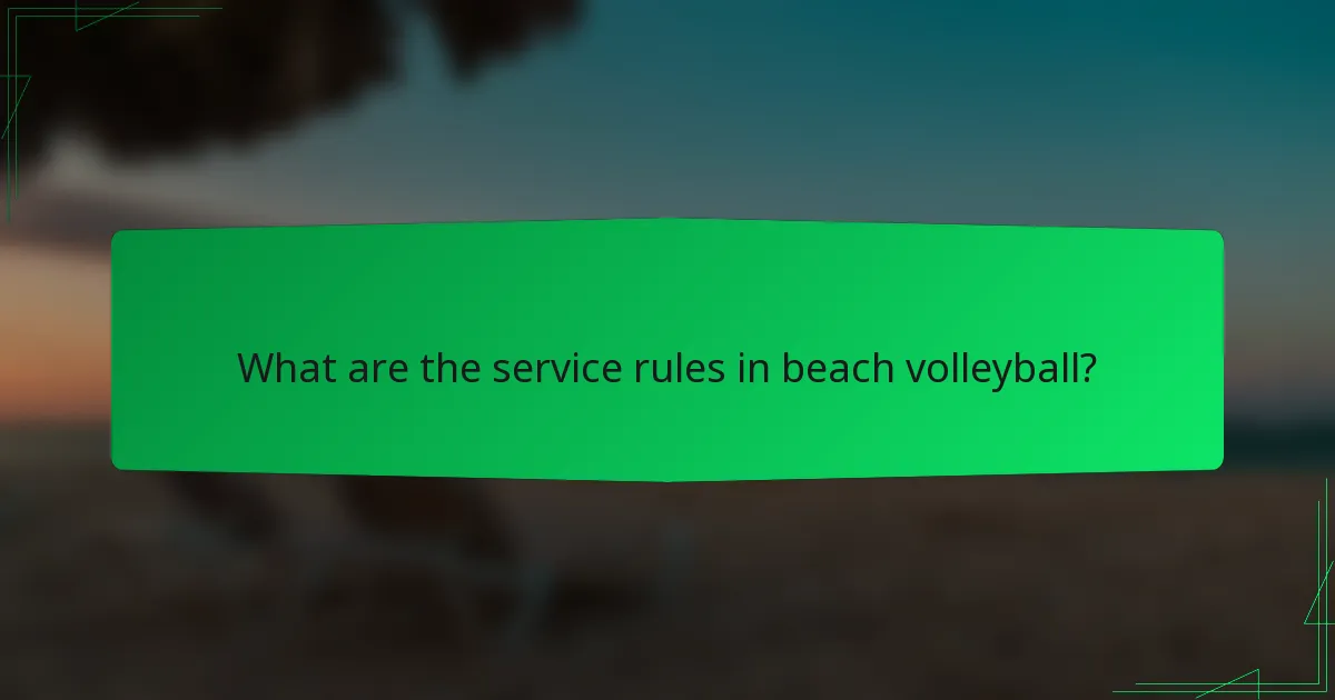 What are the service rules in beach volleyball?