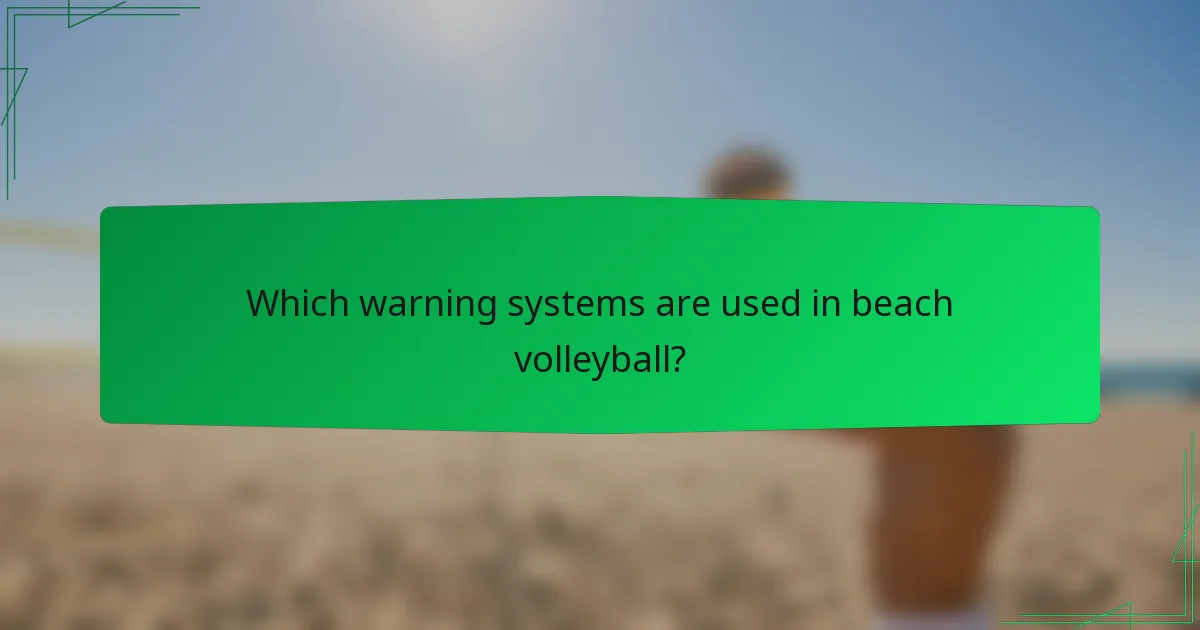 Which warning systems are used in beach volleyball?